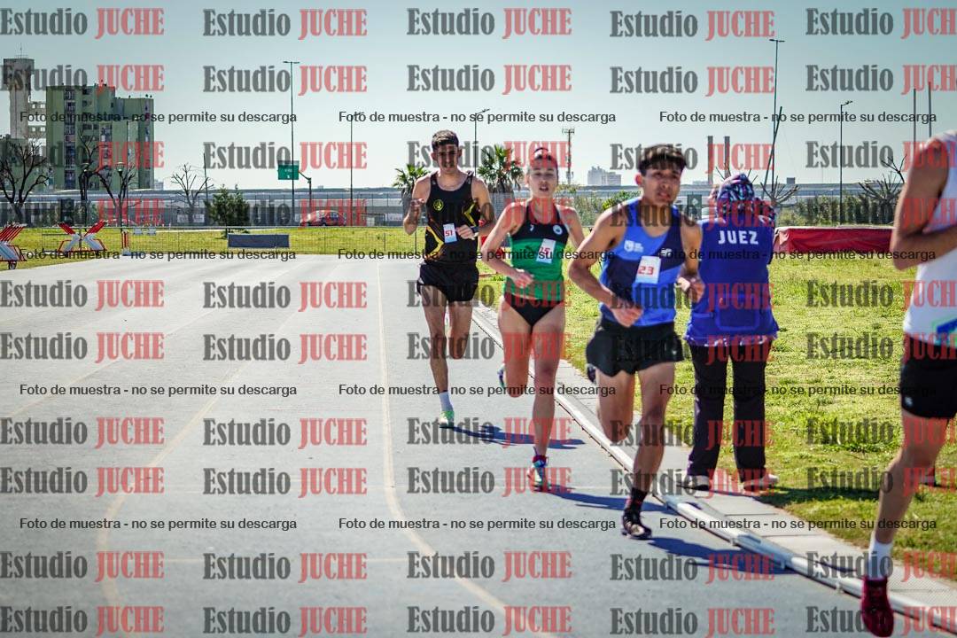 Fotos de los 5000 m llanos de mujeres y varones