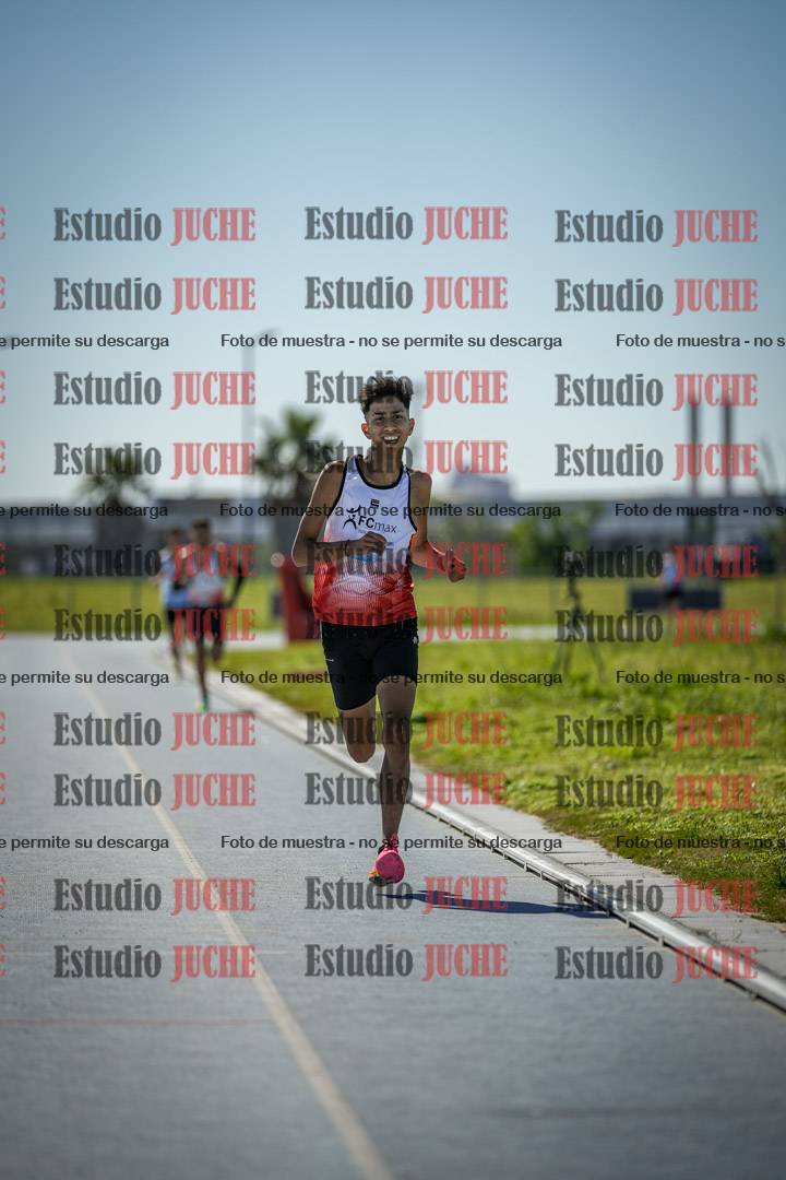 Fotos de los 5000 m llanos de mujeres y varones