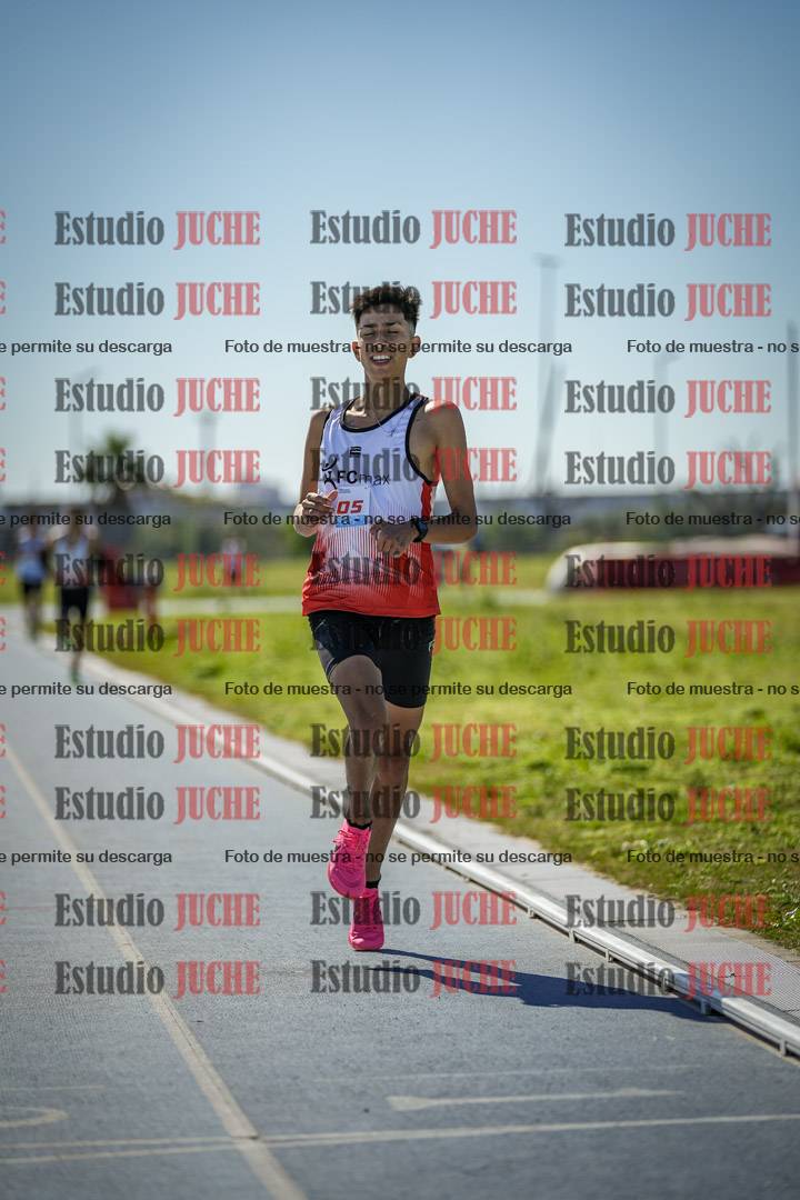 Fotos de los 5000 m llanos de mujeres y varones