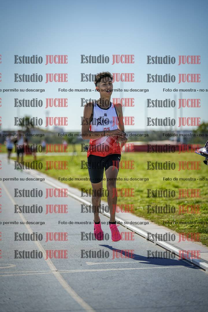 Fotos de los 5000 m llanos de mujeres y varones