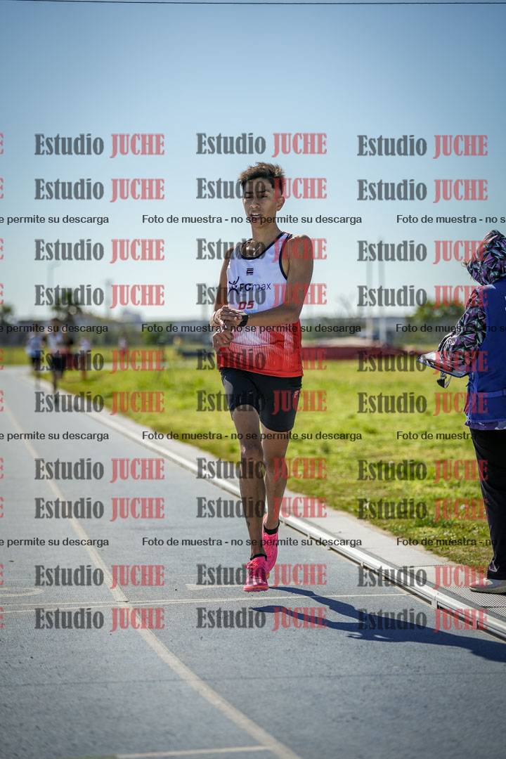 Fotos de los 5000 m llanos de mujeres y varones