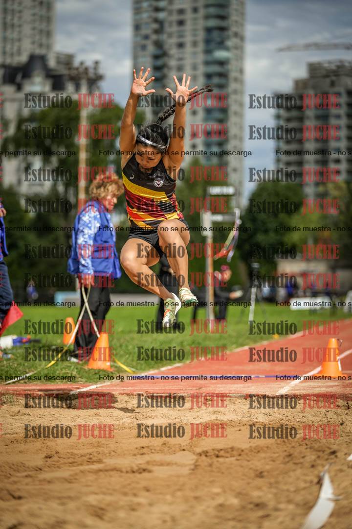 Fotos del salto en largo - mujeres mayores