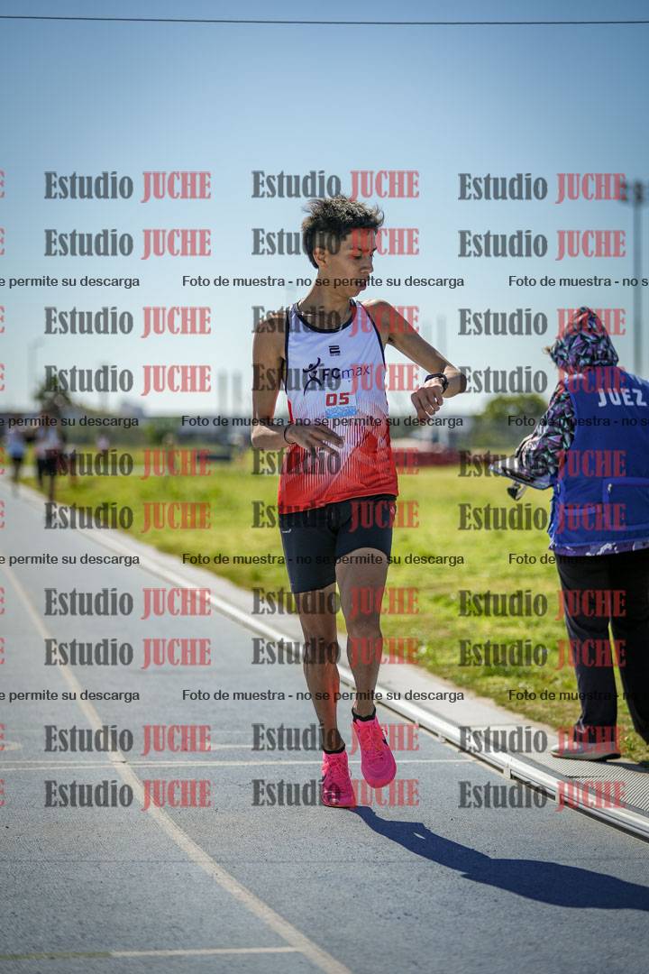 Fotos de los 5000 m llanos de mujeres y varones