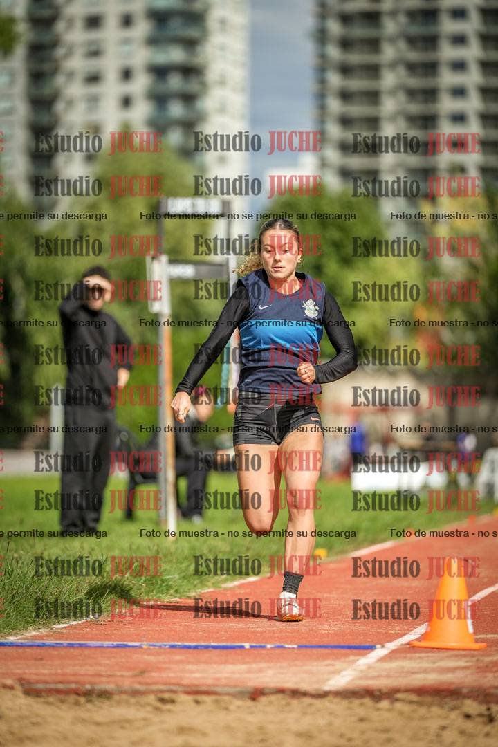 Fotos del salto en largo - mujeres mayores