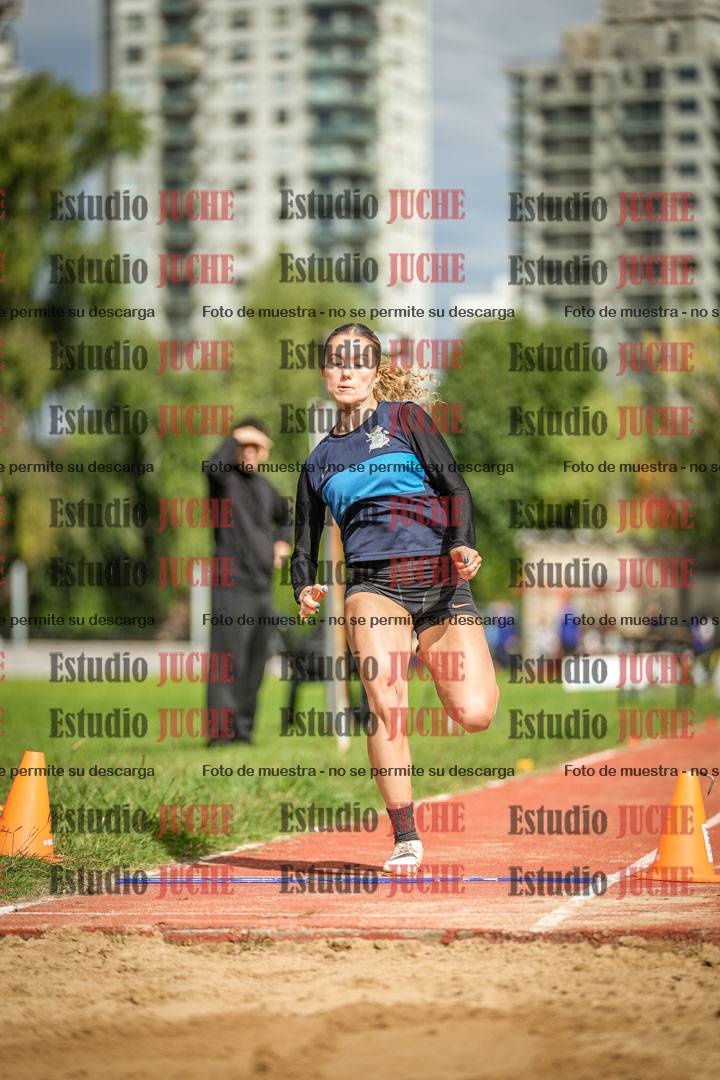 Fotos del salto en largo - mujeres mayores