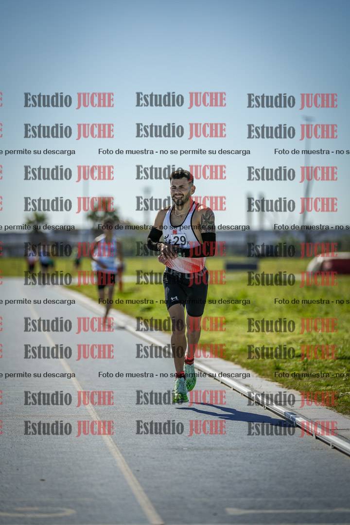Fotos de los 5000 m llanos de mujeres y varones