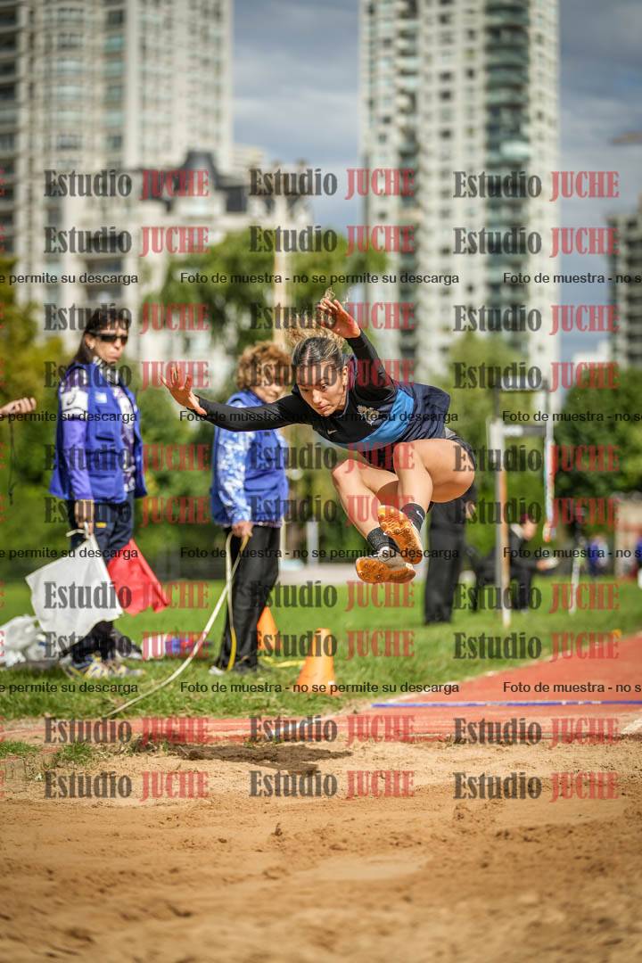 Fotos del salto en largo - mujeres mayores