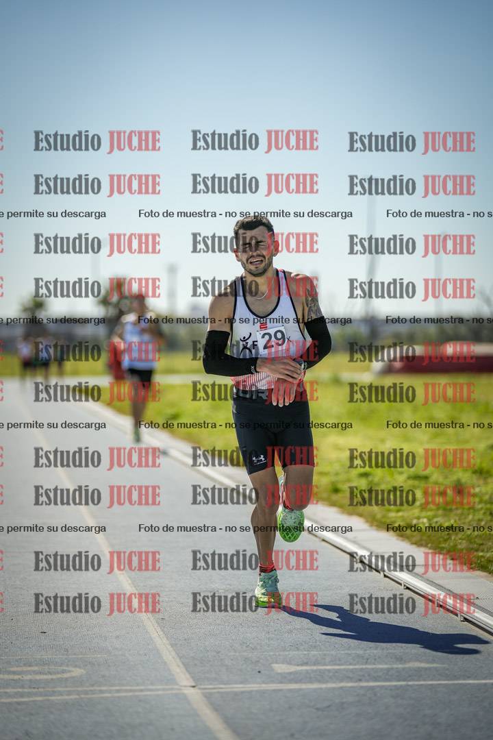 Fotos de los 5000 m llanos de mujeres y varones