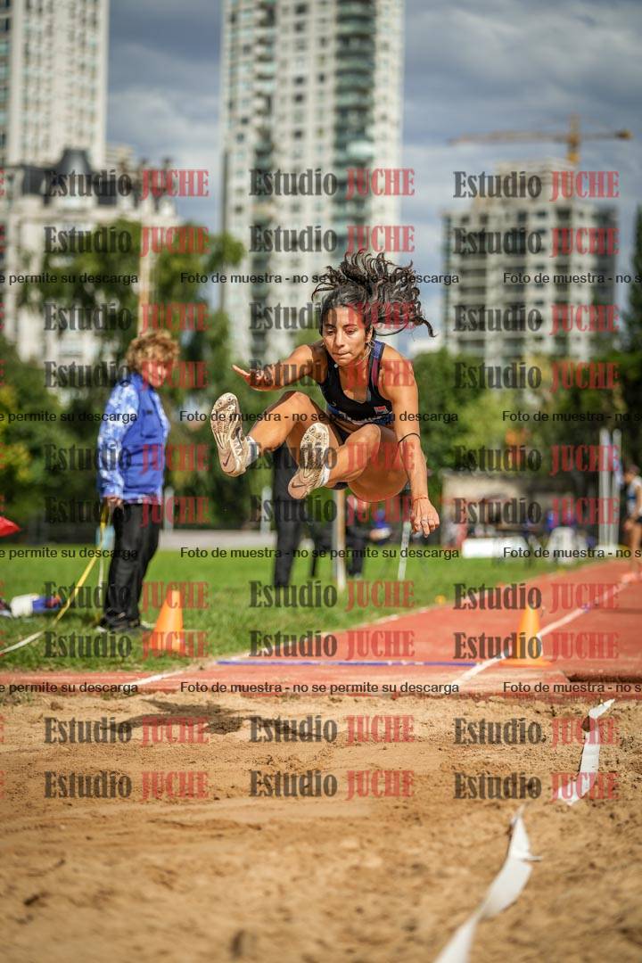 Fotos del salto en largo - mujeres mayores