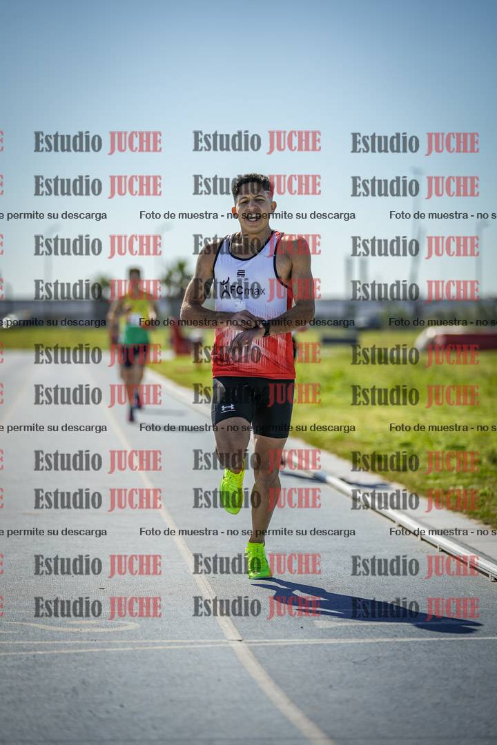 Fotos de los 5000 m llanos de mujeres y varones