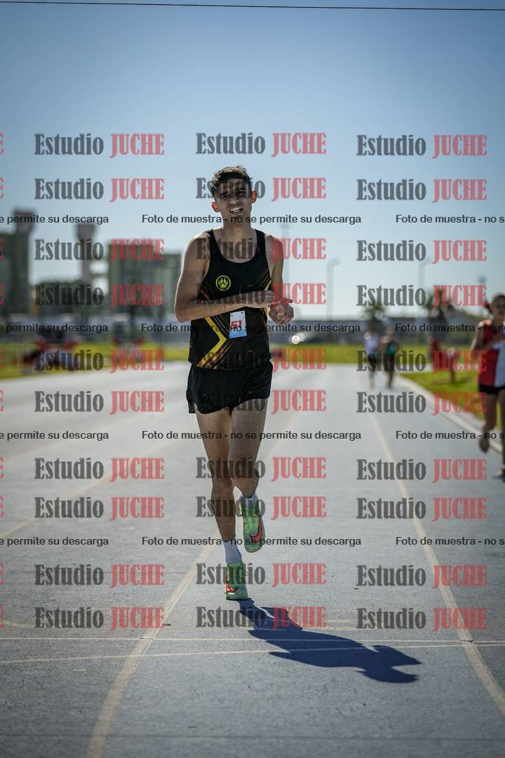Fotos de los 5000 m llanos de mujeres y varones