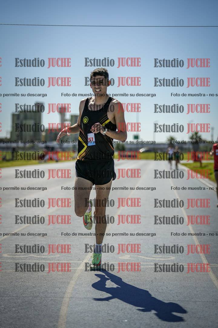 Fotos de los 5000 m llanos de mujeres y varones
