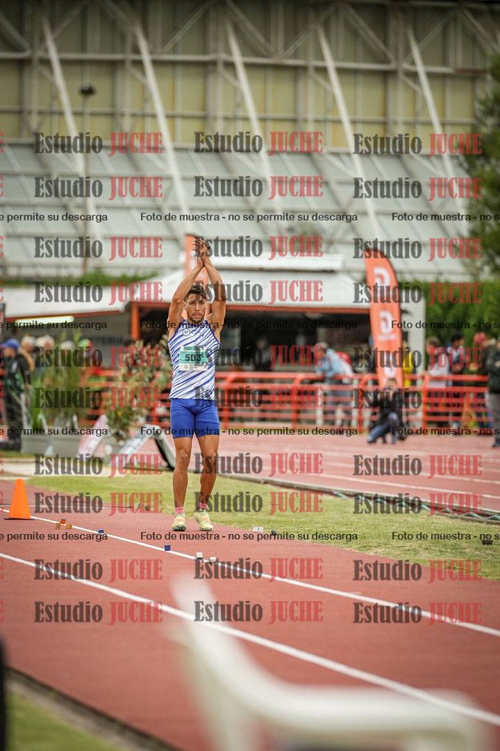 Fotos del salto en largo de varones