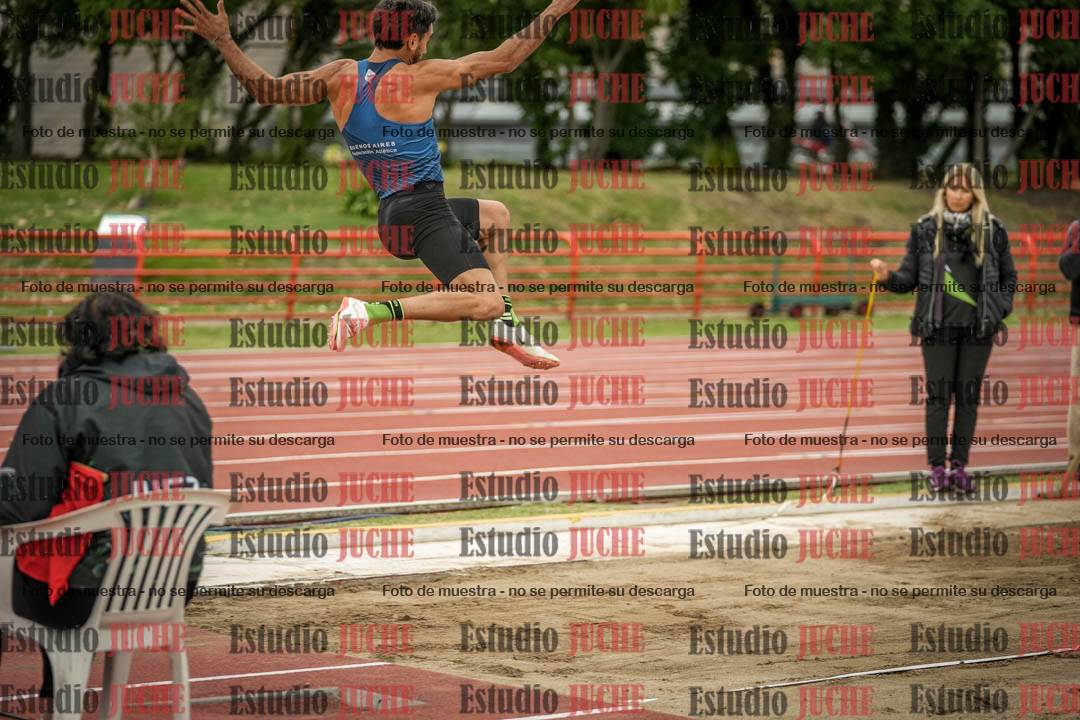 Fotos del salto en largo de varones