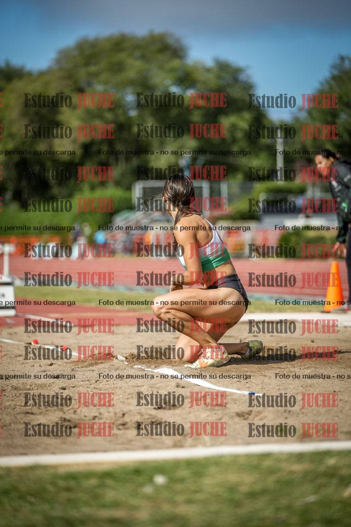 Fotos del salto en largo de mujeres