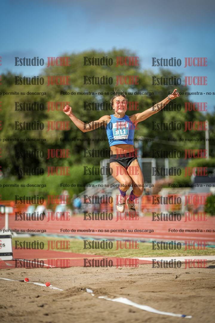 Fotos del salto en largo de mujeres