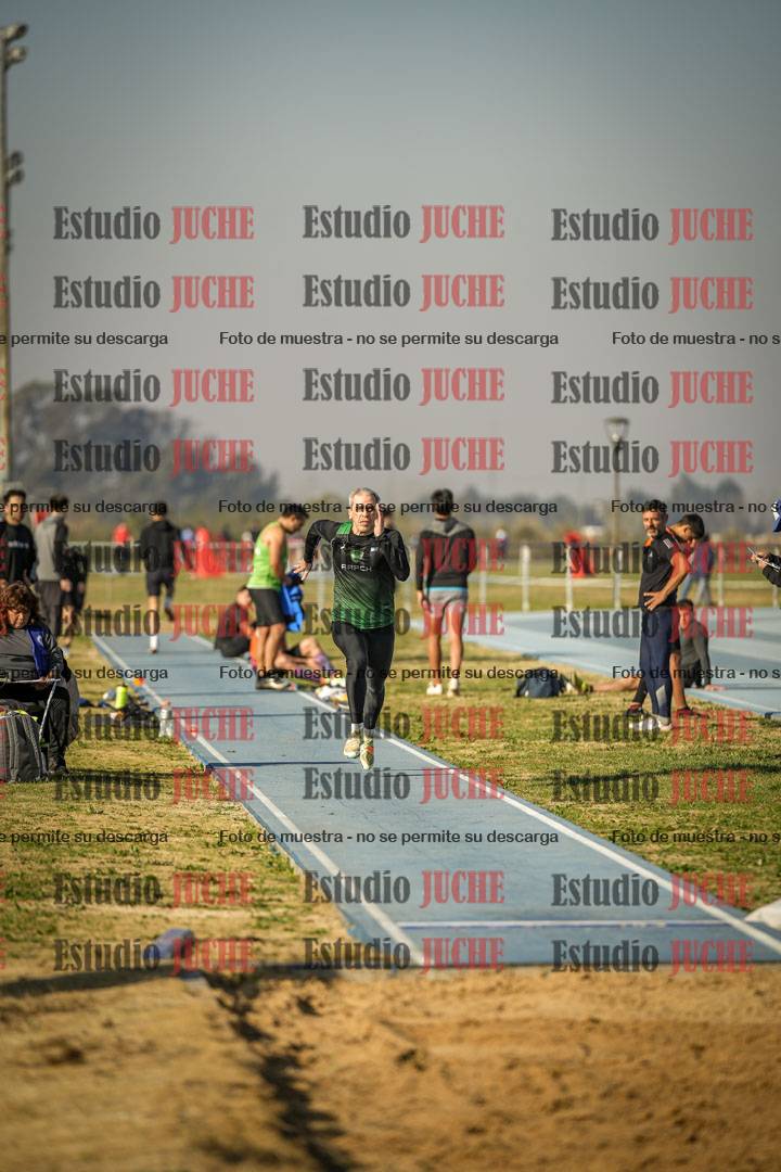 Fotos del salto en largo de varones