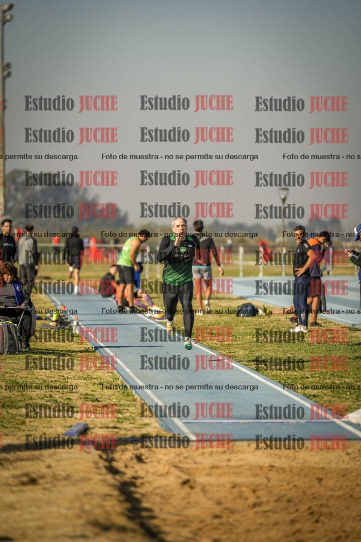 Fotos del salto en largo de varones