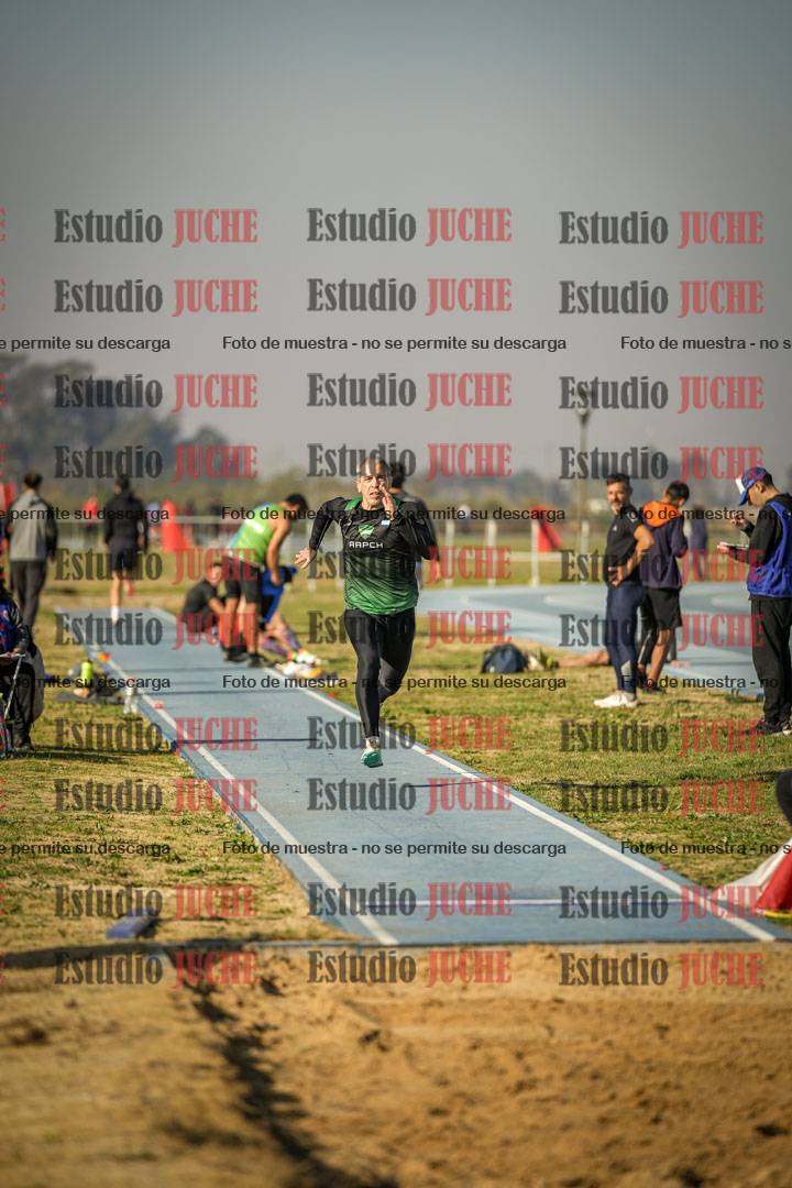 Fotos del salto en largo de varones