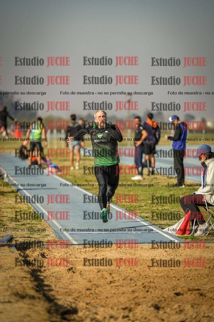 Fotos del salto en largo de varones