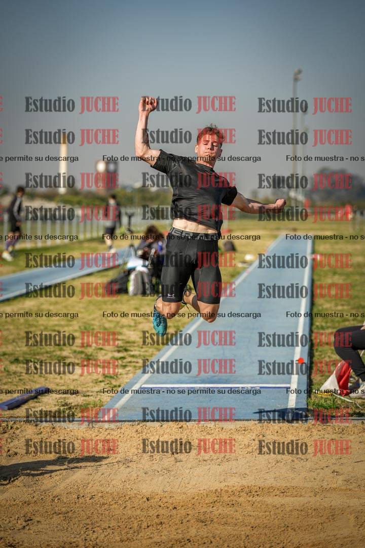 Fotos del salto en largo de varones