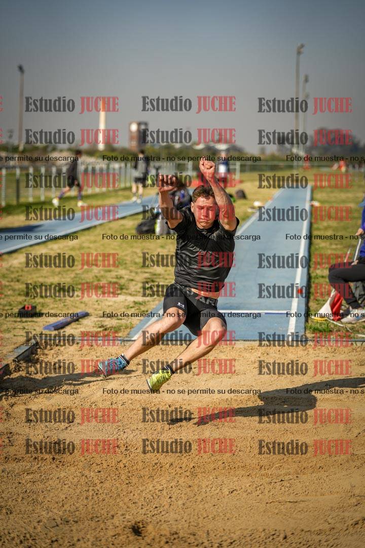 Fotos del salto en largo de varones