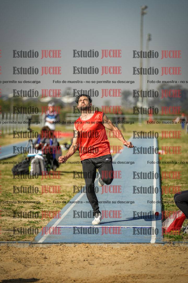 Fotos del salto en largo de varones