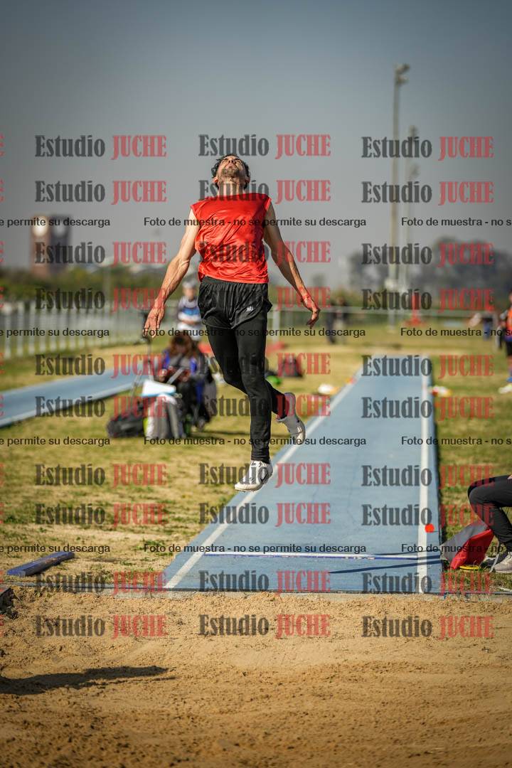 Fotos del salto en largo de varones