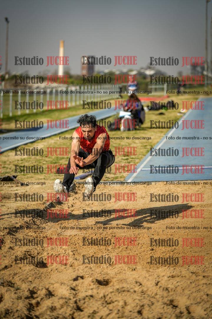 Fotos del salto en largo de varones