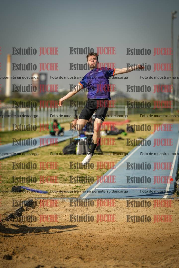 Fotos del salto en largo de varones