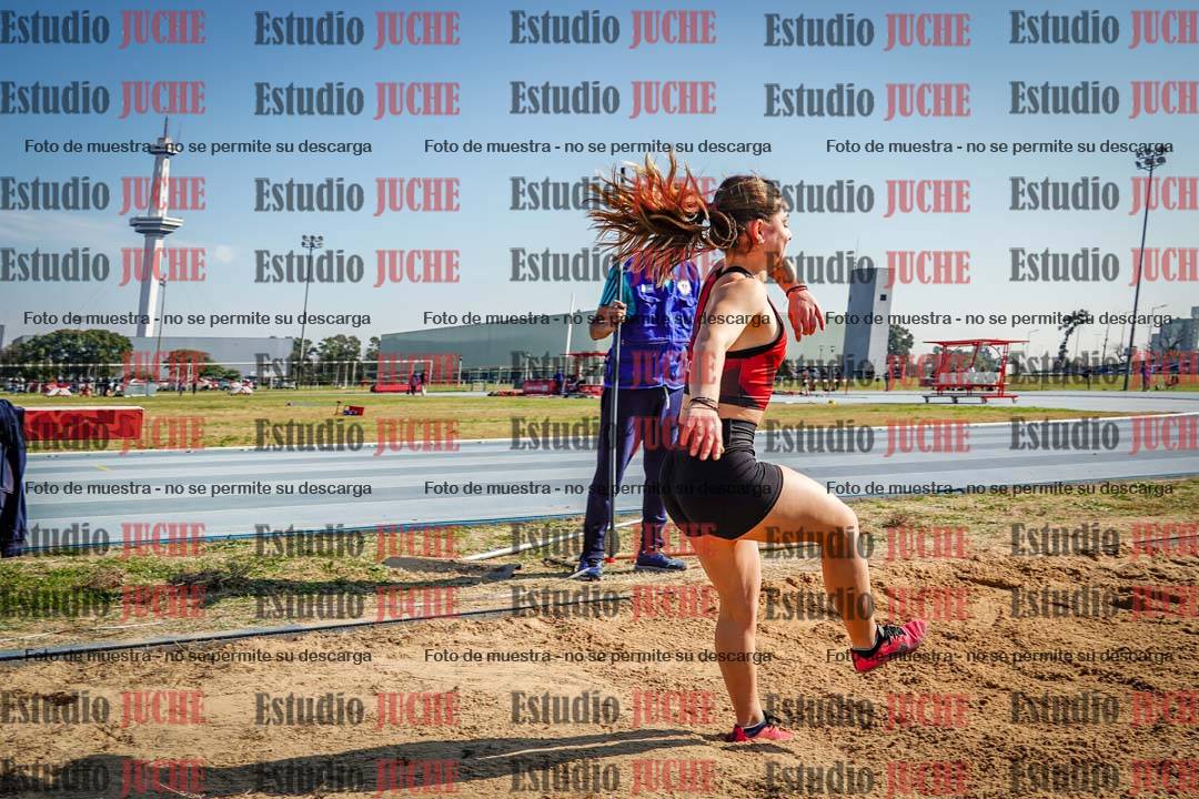 Fotos del salto en largo de mujeres