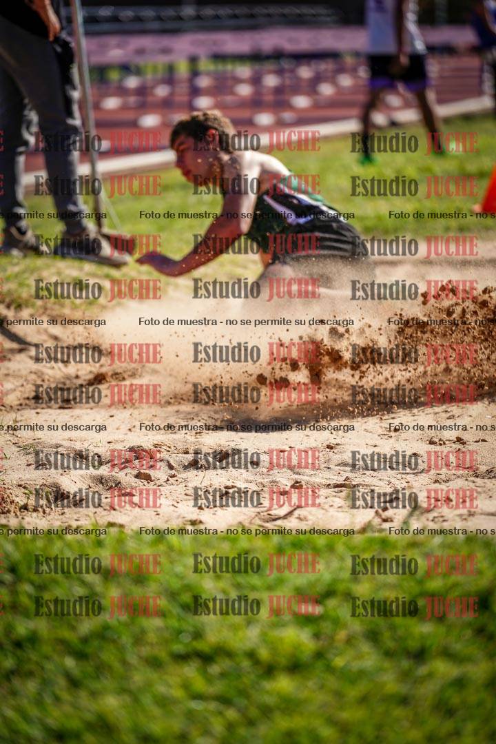 Fotos del salto en largo de varones