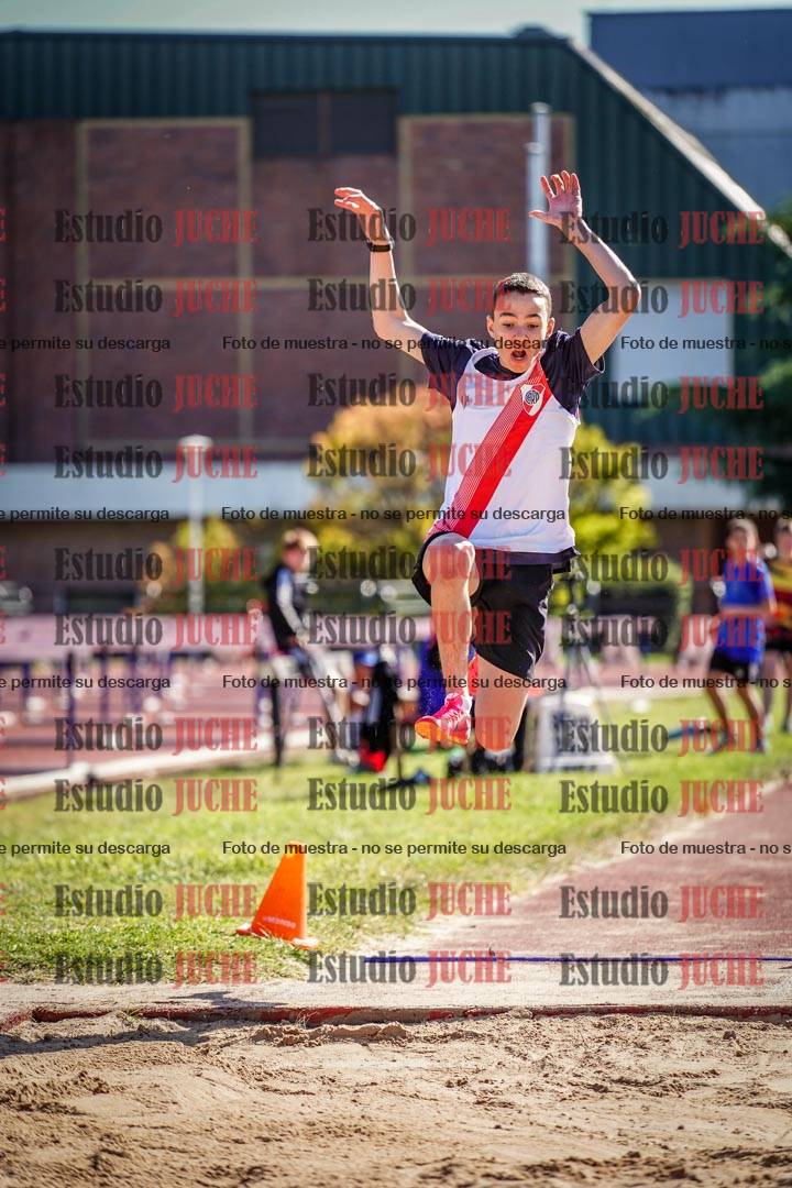 Fotos del salto en largo de varones