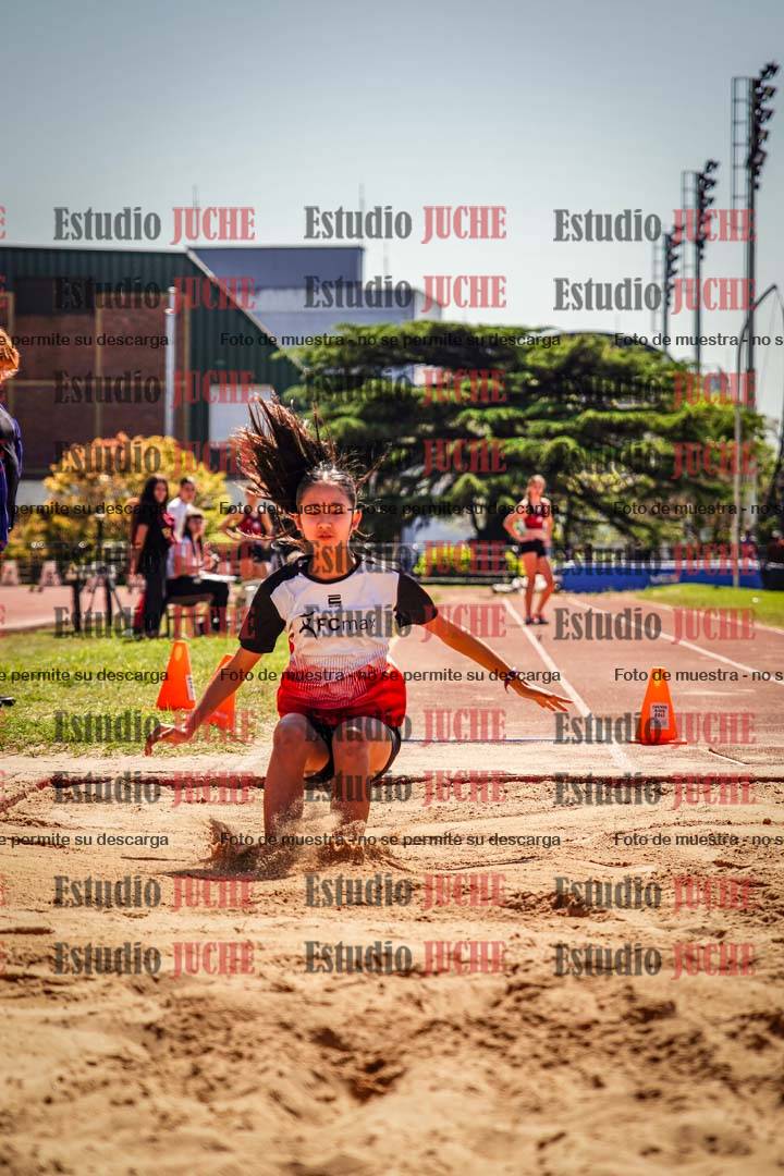 Fotos del salto en largo de mujeres