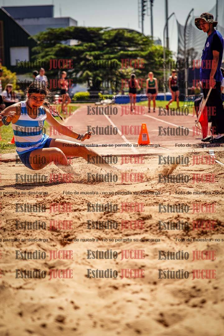 Fotos del salto en largo de mujeres