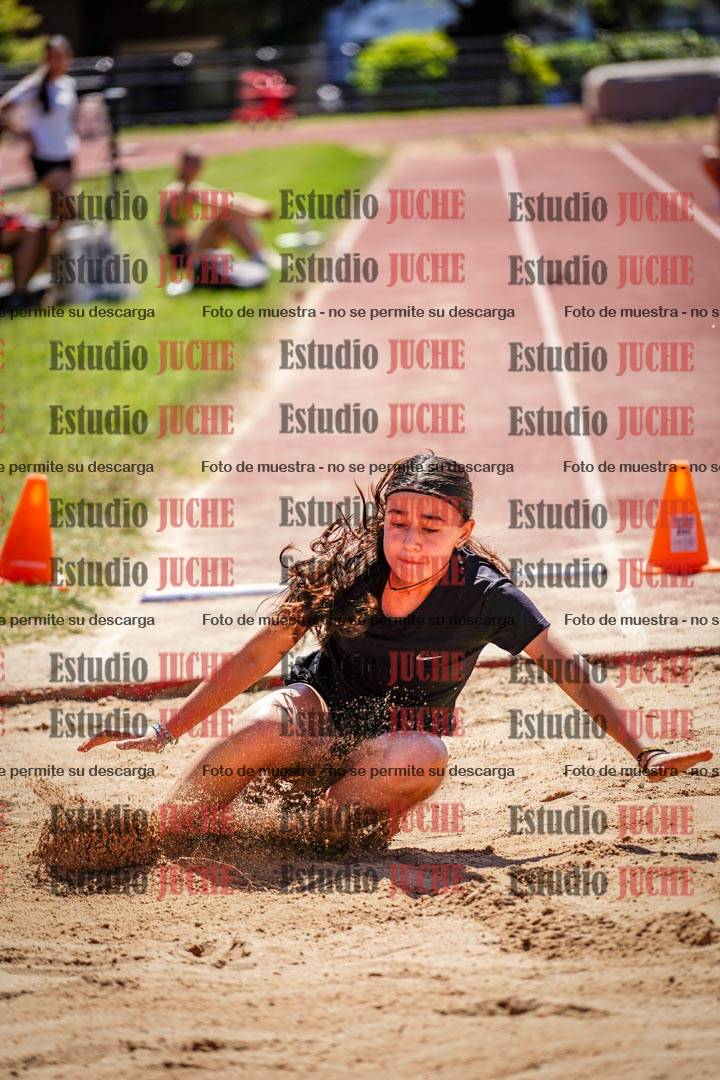 Fotos del salto en largo de mujeres