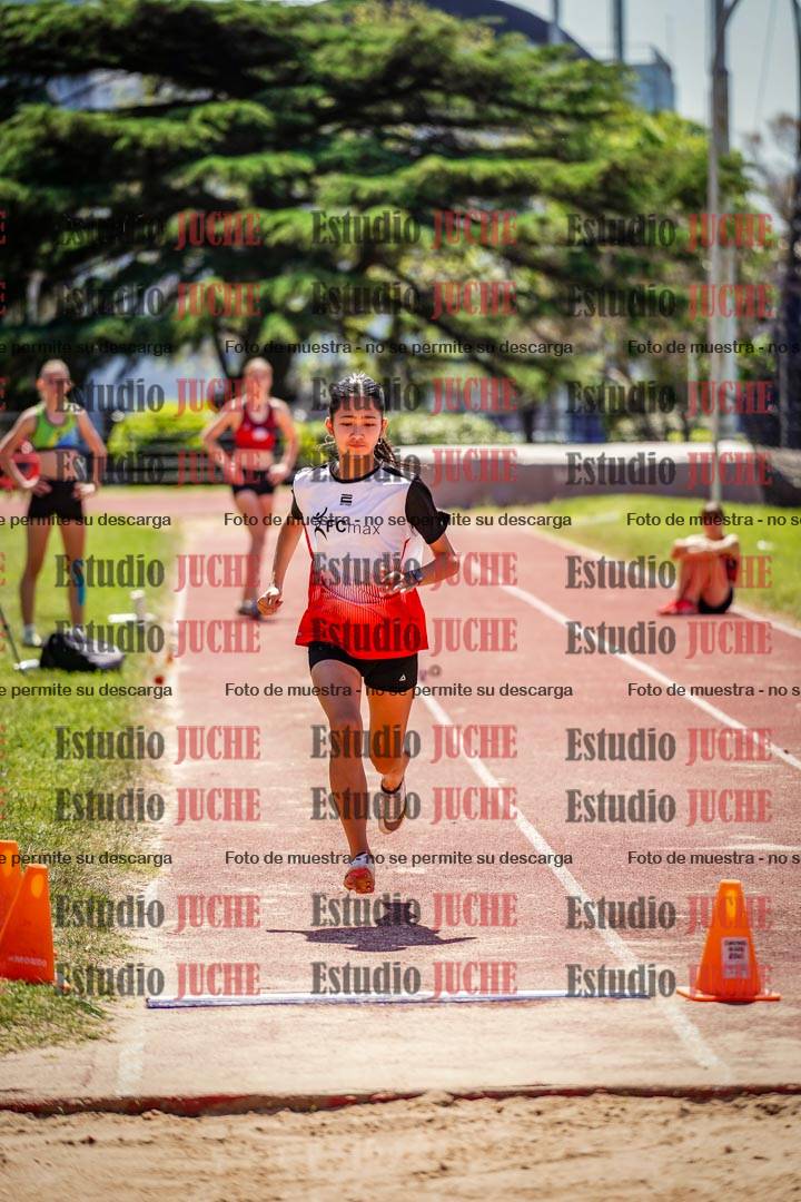 Fotos del salto en largo de mujeres