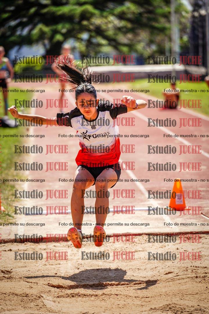 Fotos del salto en largo de mujeres