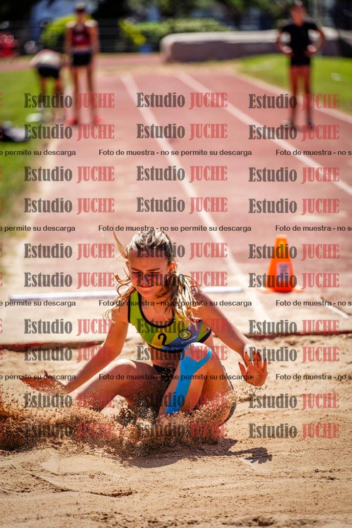Fotos del salto en largo de mujeres
