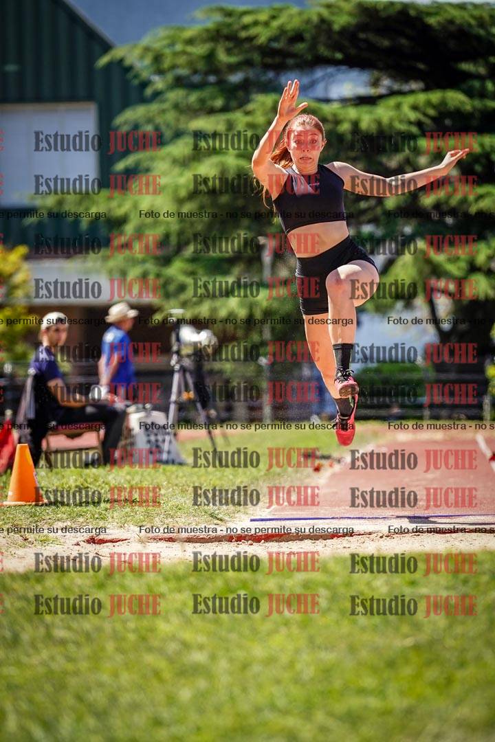 Fotos del salto en largo de mujeres