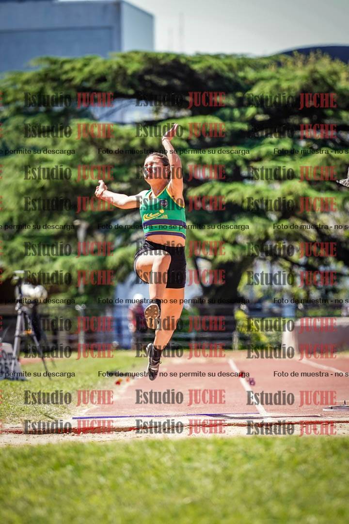 Fotos del salto en largo de mujeres