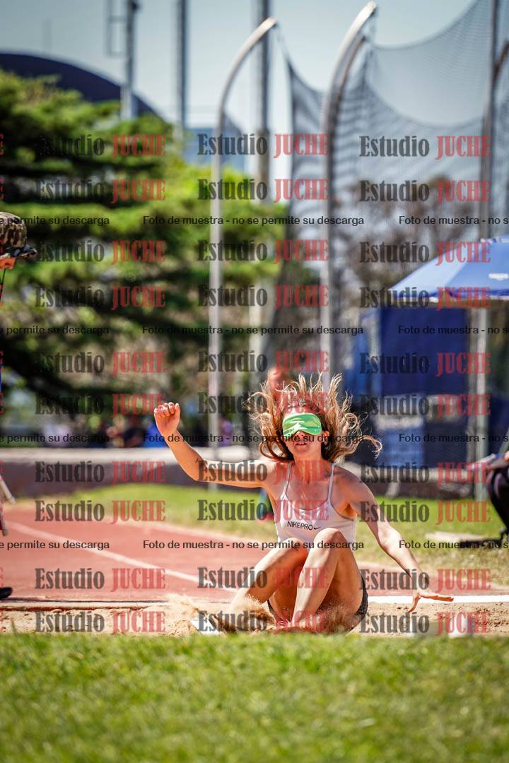 Fotos del salto en largo de mujeres