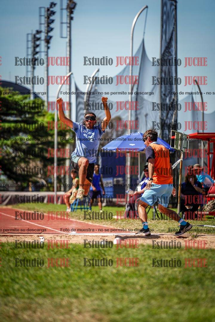 Fotos del salto en largo de varones