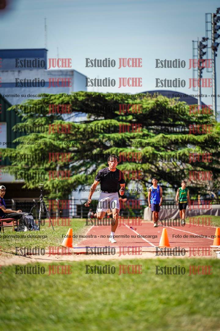 Fotos del salto en largo de varones