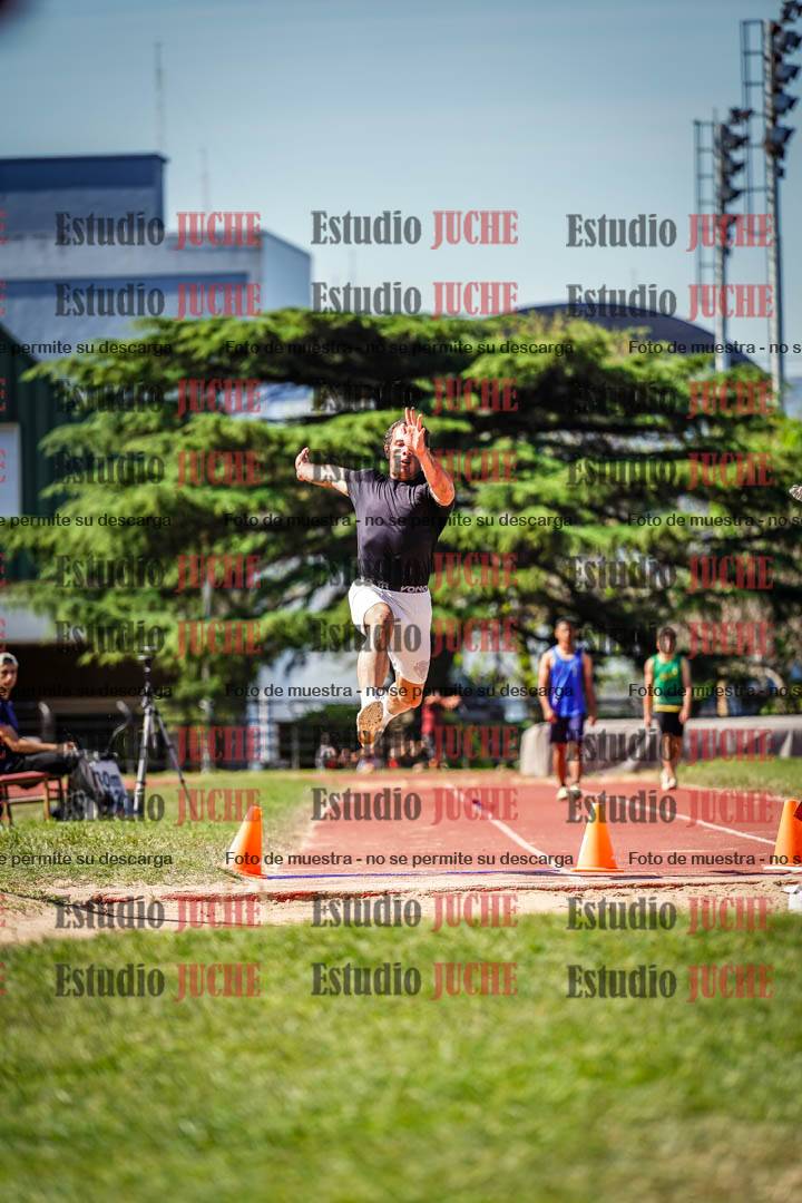 Fotos del salto en largo de varones