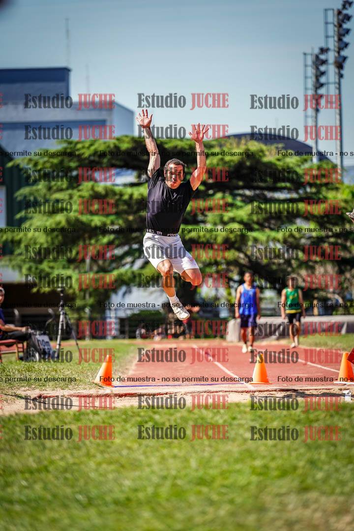 Fotos del salto en largo de varones