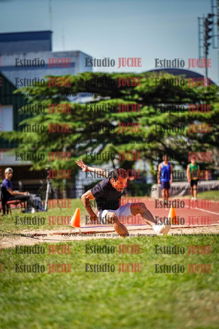 Fotos del salto en largo de varones