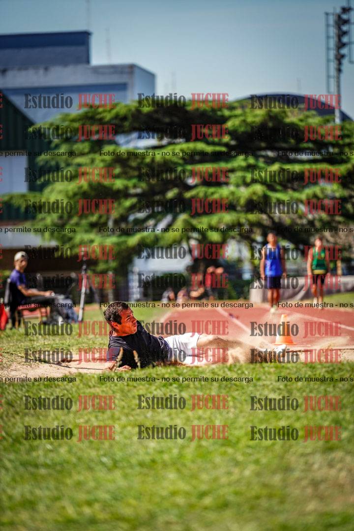 Fotos del salto en largo de varones