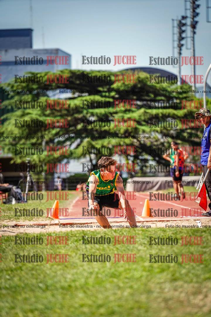 Fotos del salto en largo de varones
