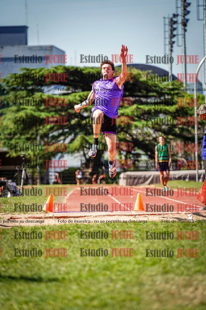 Fotos del salto en largo de varones